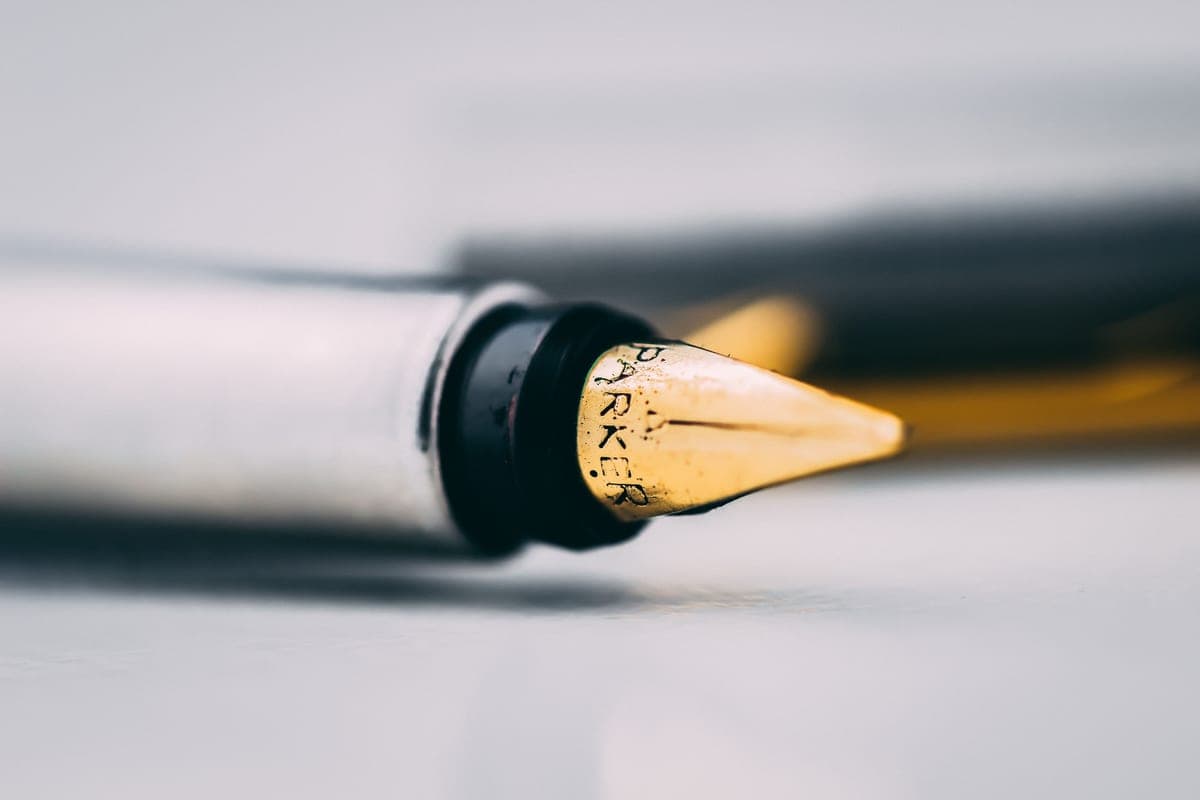 Filling a fountain pen with ink from a bottle